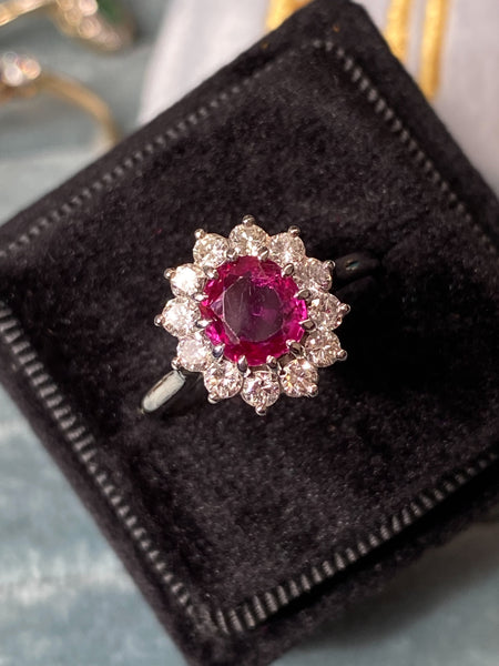 1.00 Carat Ruby and Diamond Halo Ring in 18ct White Gold