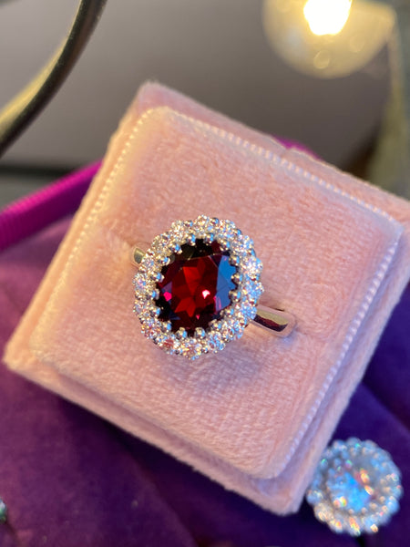 2.33 CTW Oval Cut Garnet and Moissanite Halo Cocktail Ring