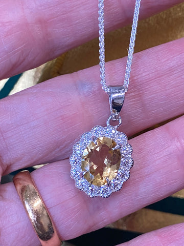 5.00 CTW Citrine and Moissanite Halo Pendant Necklace in Sterling Silver