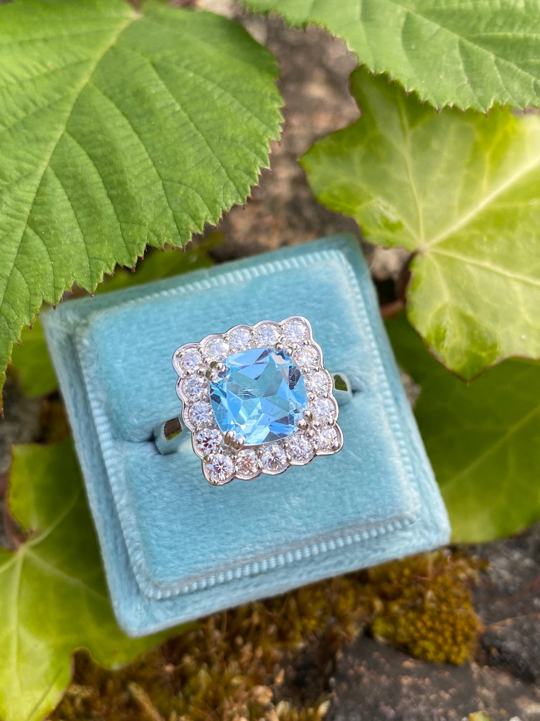 4.29 CTW Cushion Cut Blue Topaz and Moissanite Halo Cocktail Ring in Sterling Silver