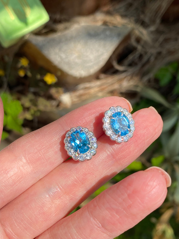 4.71 CTW Oval Cut Blue Topaz and Moissanite Earrings in Sterling Silver