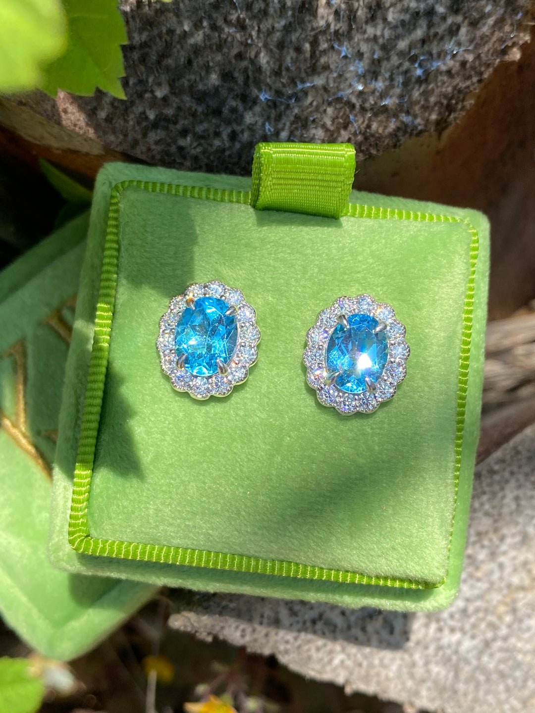 4.71 CTW Oval Cut Blue Topaz and Moissanite Earrings in Sterling Silver