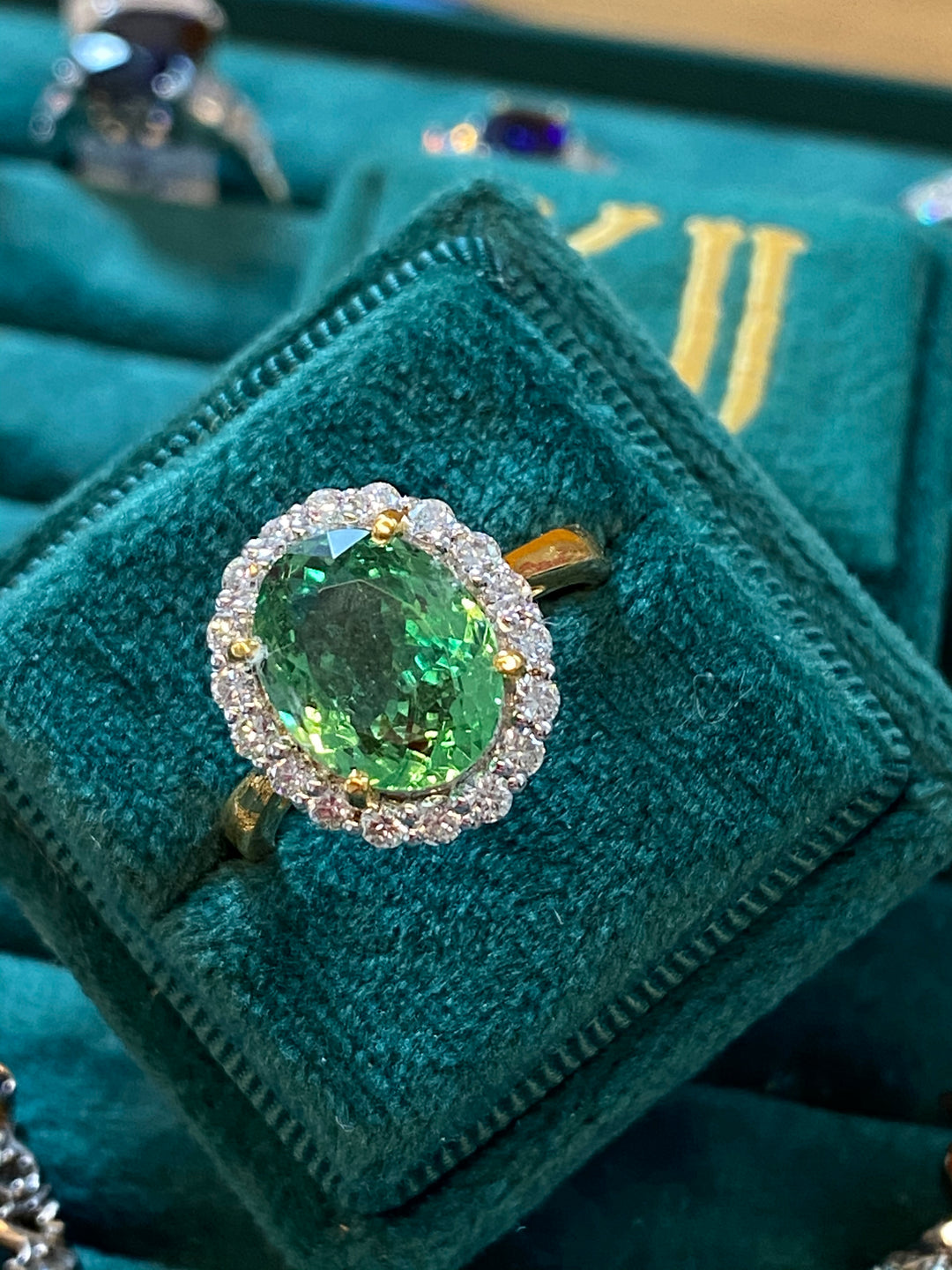 4.50 Carat Oval Tsavorite Green Garnet and Diamond Halo Engagement Ring 