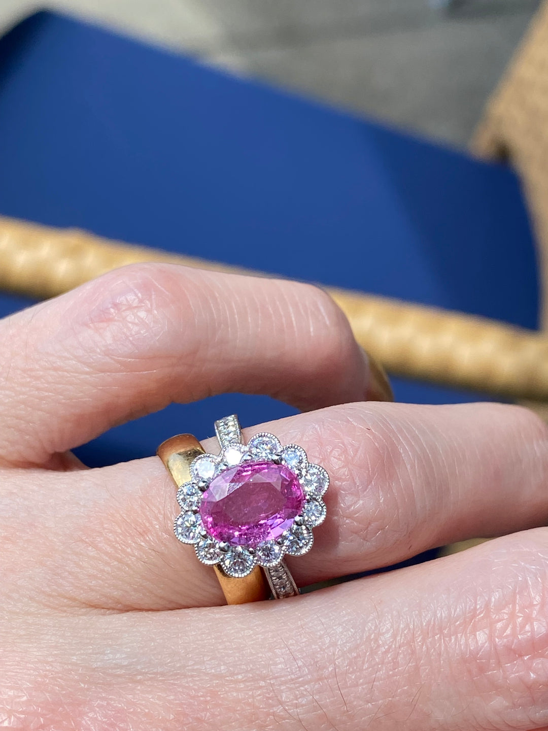 2.02 Carat Oval Cut Pink Sapphire and 0.90 CTW Diamond Halo Ring in Platinum