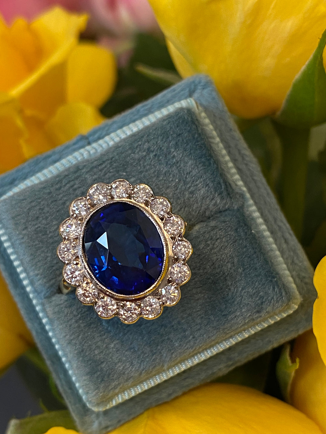5.35 Carat Blue Ceylon Sapphire and Diamond Halo Ring in 18ct Gold