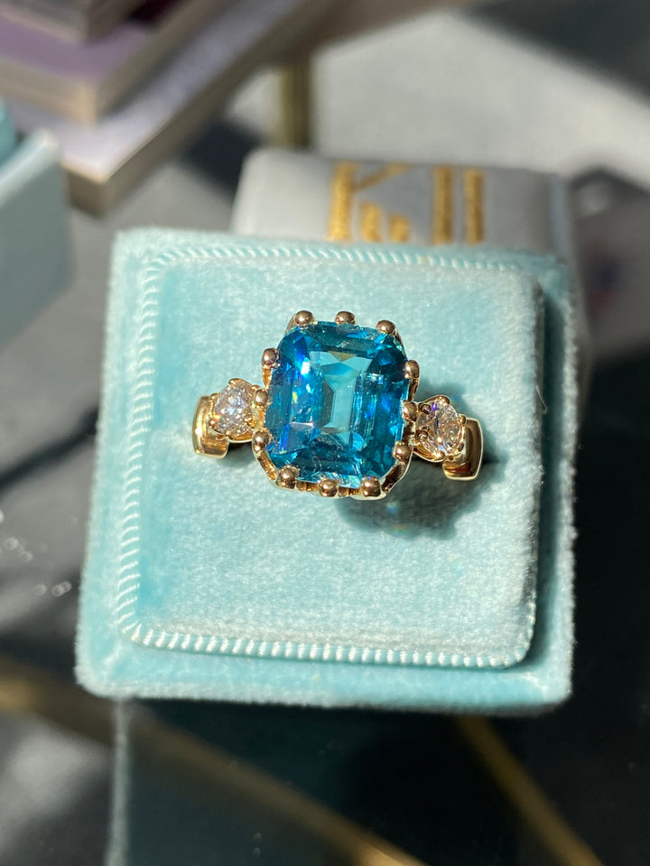 6.75 Carat Blue Zircon and Diamond Three Stone Ring in 18ct Yellow Gold