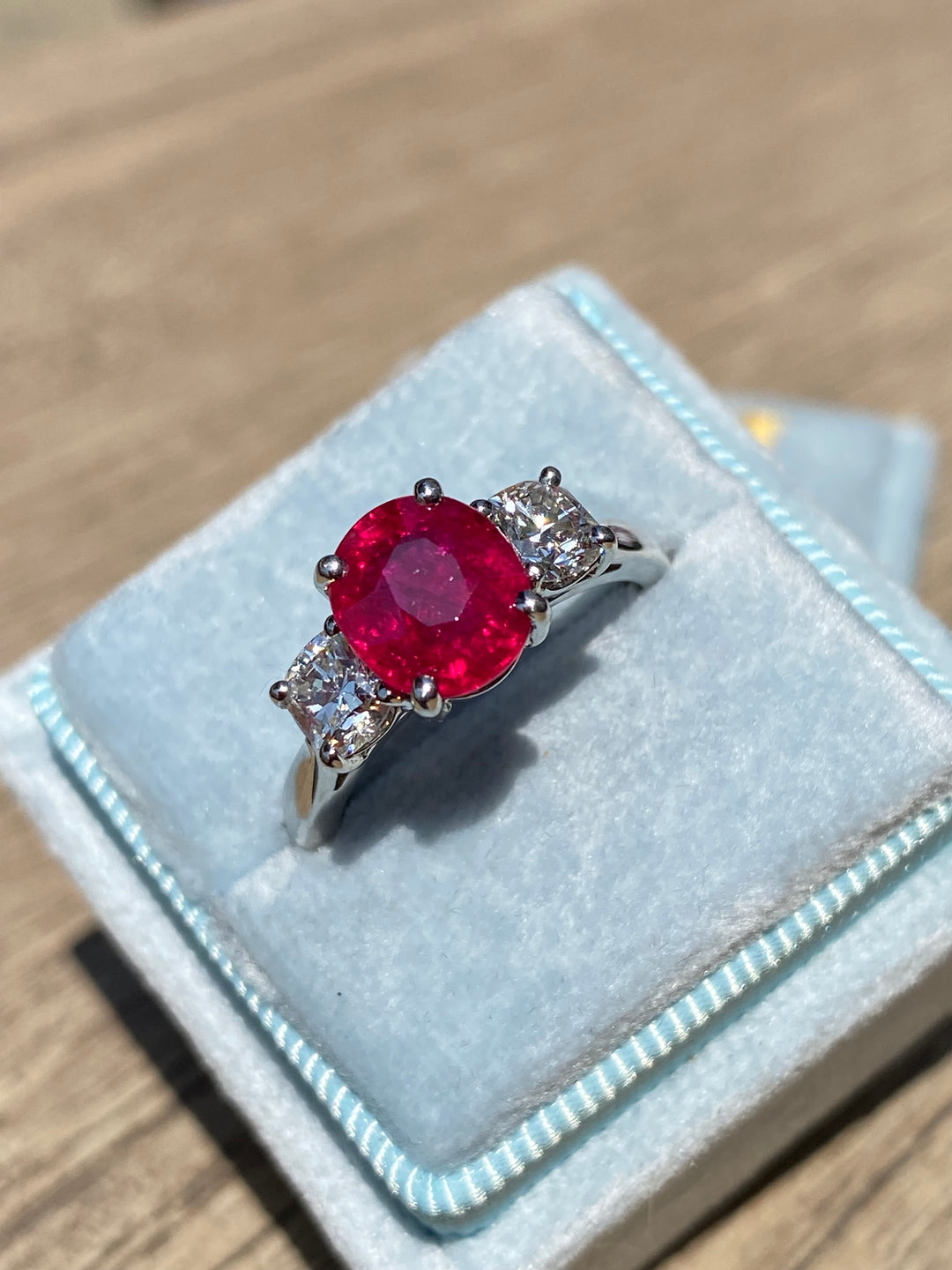 2.41 Carat Oval Ruby and Diamond Three-Stone Engagement Ring in Platinum