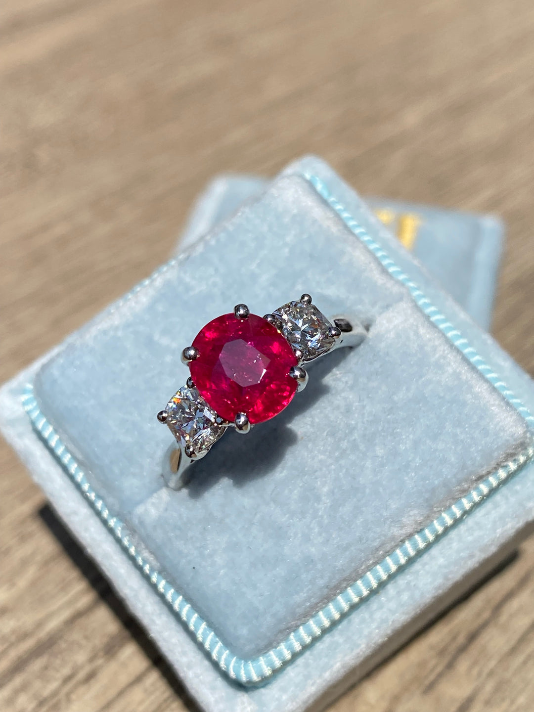 2.41 Carat Oval Ruby and Diamond Three-Stone Engagement Ring in Platinum