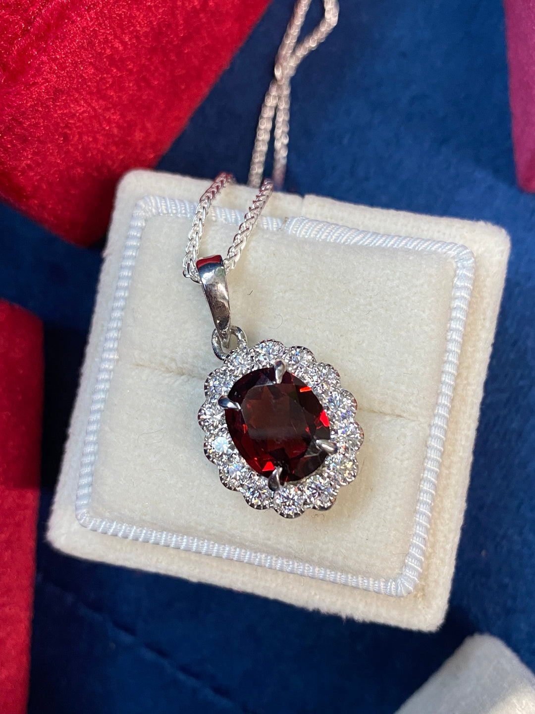5.00 CTW Garnet and Moissanite Halo Pendant Necklace in Sterling Silver