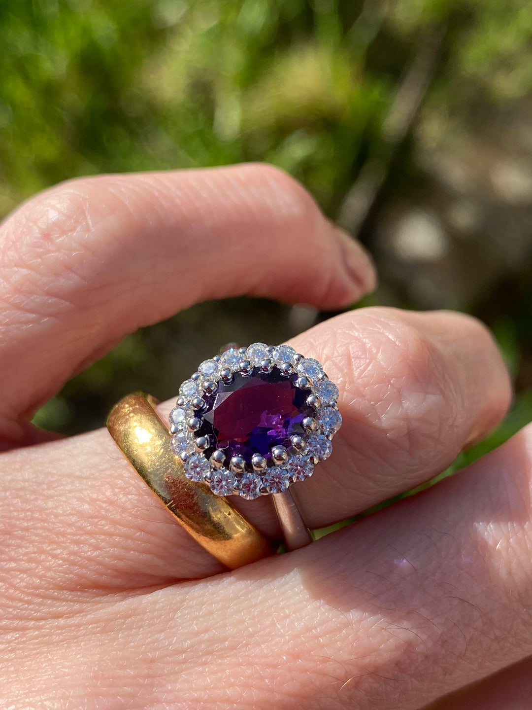 2.33 CTW Oval Cut Amethyst and Moissanite Halo Cocktail Ring in Sterling Silver
