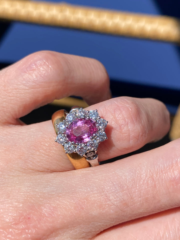 2.65 CTW Oval Cut Pink Sapphire and Diamond Halo Ring in Platinum