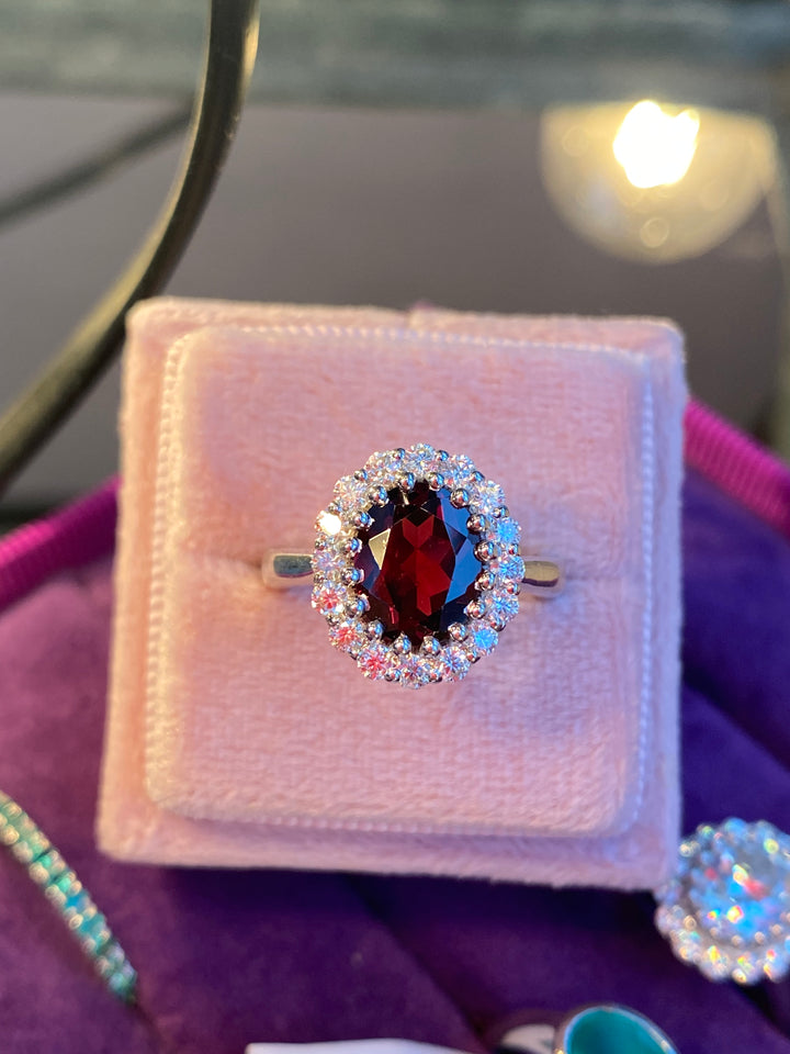2.33 CTW Oval Cut Garnet and Moissanite Halo Cocktail Ring
