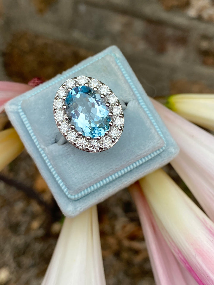 9.60 CTW Oval Cut Blue Topaz and Moissanite Halo Cocktail Ring in Sterling Silver