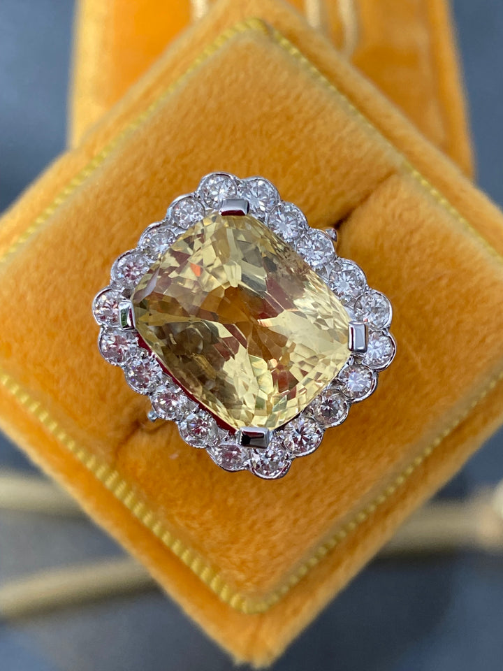 11.32 Carat Certified Unheated Yellow Sapphire and 1.05 Carat Diamond Ring