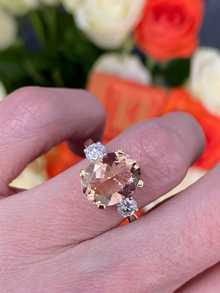 3.11ct Oval Cut Morganite and Diamond Three Stone Engagement Ring in 18ct Gold