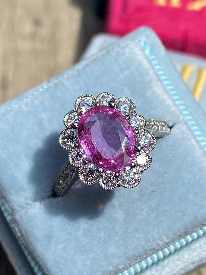 2.02 Carat Oval Cut Pink Sapphire and 0.90 CTW Diamond Halo Ring in Platinum