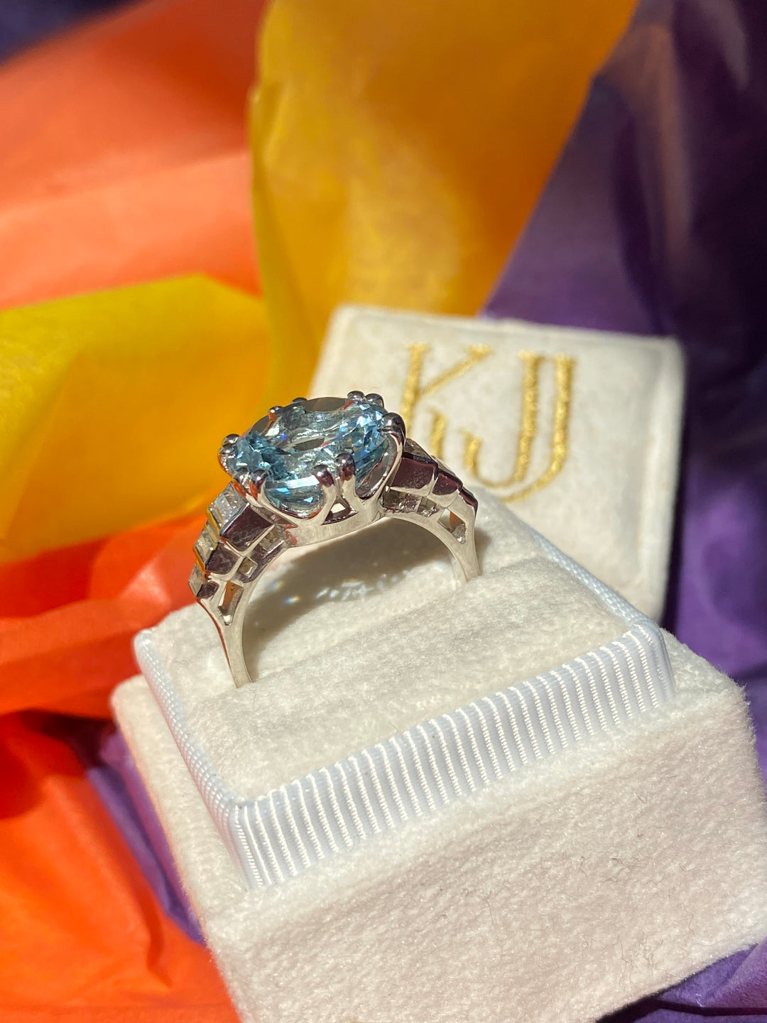 6.75 Carat Round Cut Blue Topaz and 0.40 Carat Moissanite Ring in Sterling Silver