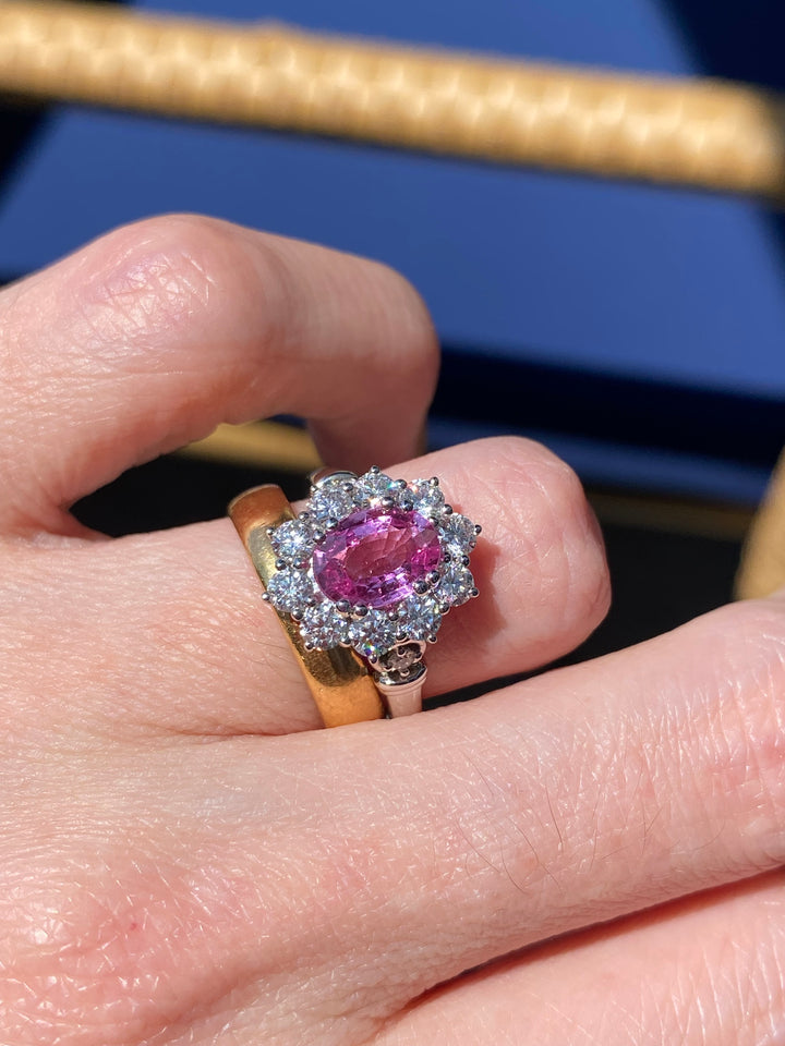 2.65 CTW Oval Cut Pink Sapphire and Diamond Halo Ring in Platinum