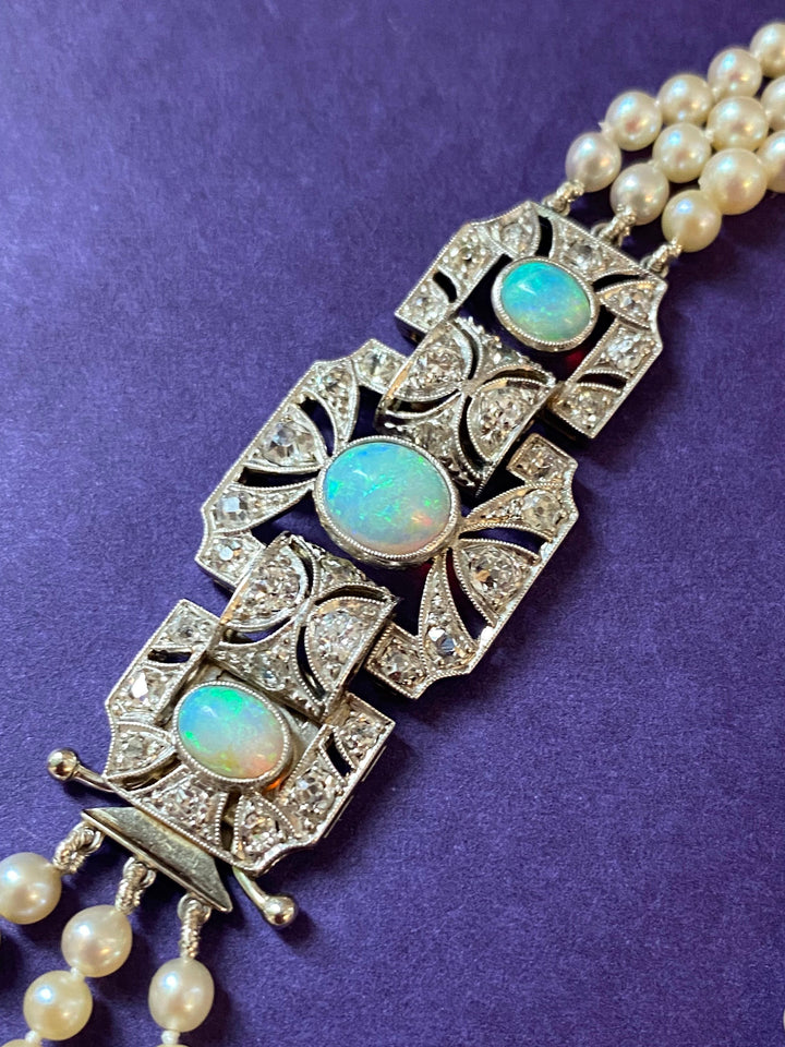 Antique Art Deco Natural and Cultured Pearl Three Strand Necklace with Opals and Diamonds set in Platinum