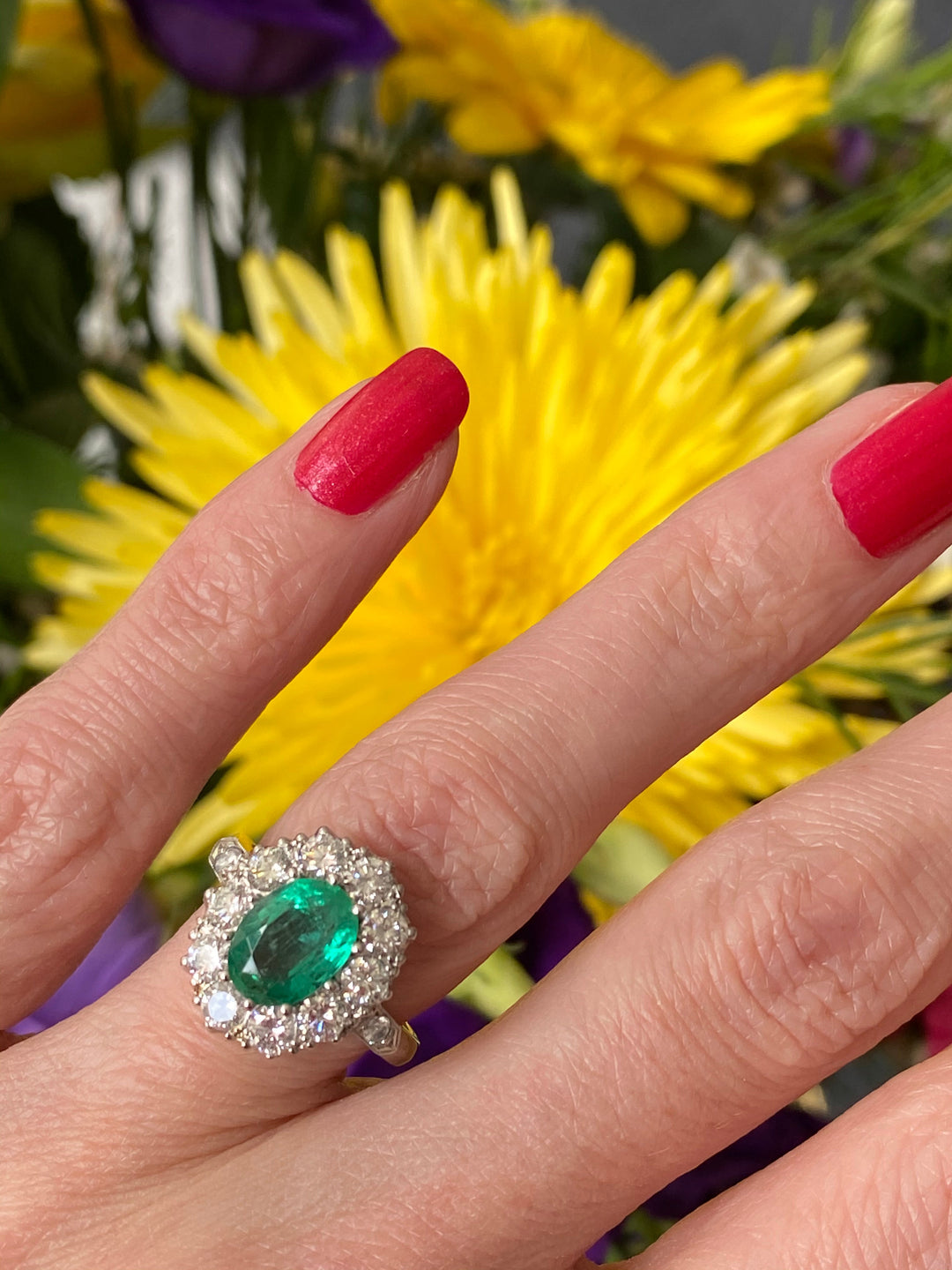 1.60 Carat Oval Emerald and Diamond Halo Engagement Ring in Platinum
