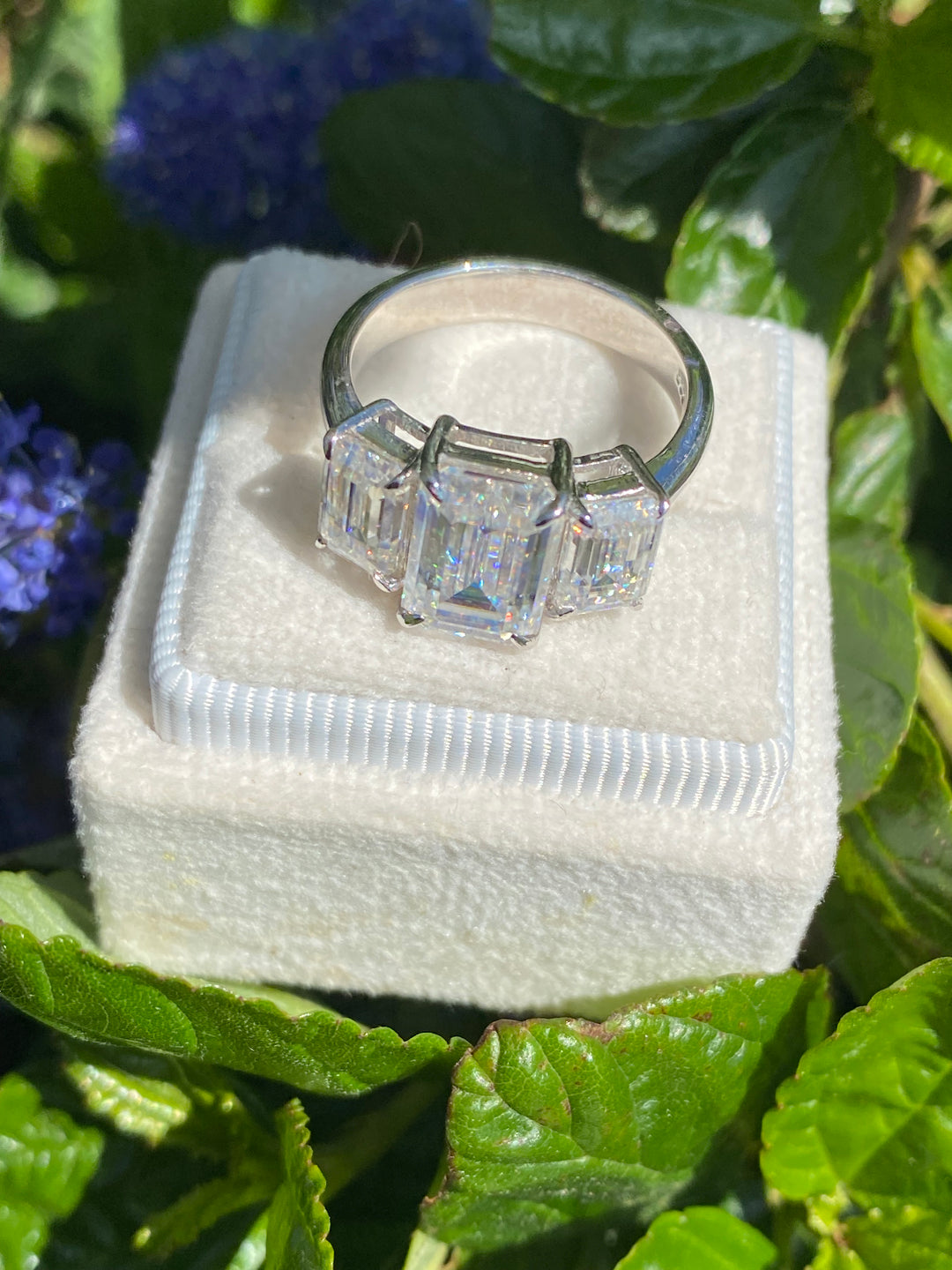 4.96 Carat Emerald Cut Moissanite Three Stone Engagement Ring in Sterling Silver