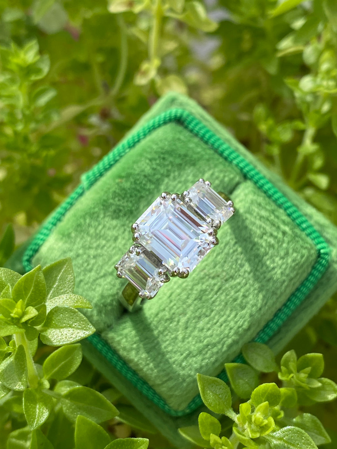 3.50 CTW Emerald Cut Moissanite Three Stone Ring in Sterling Silver