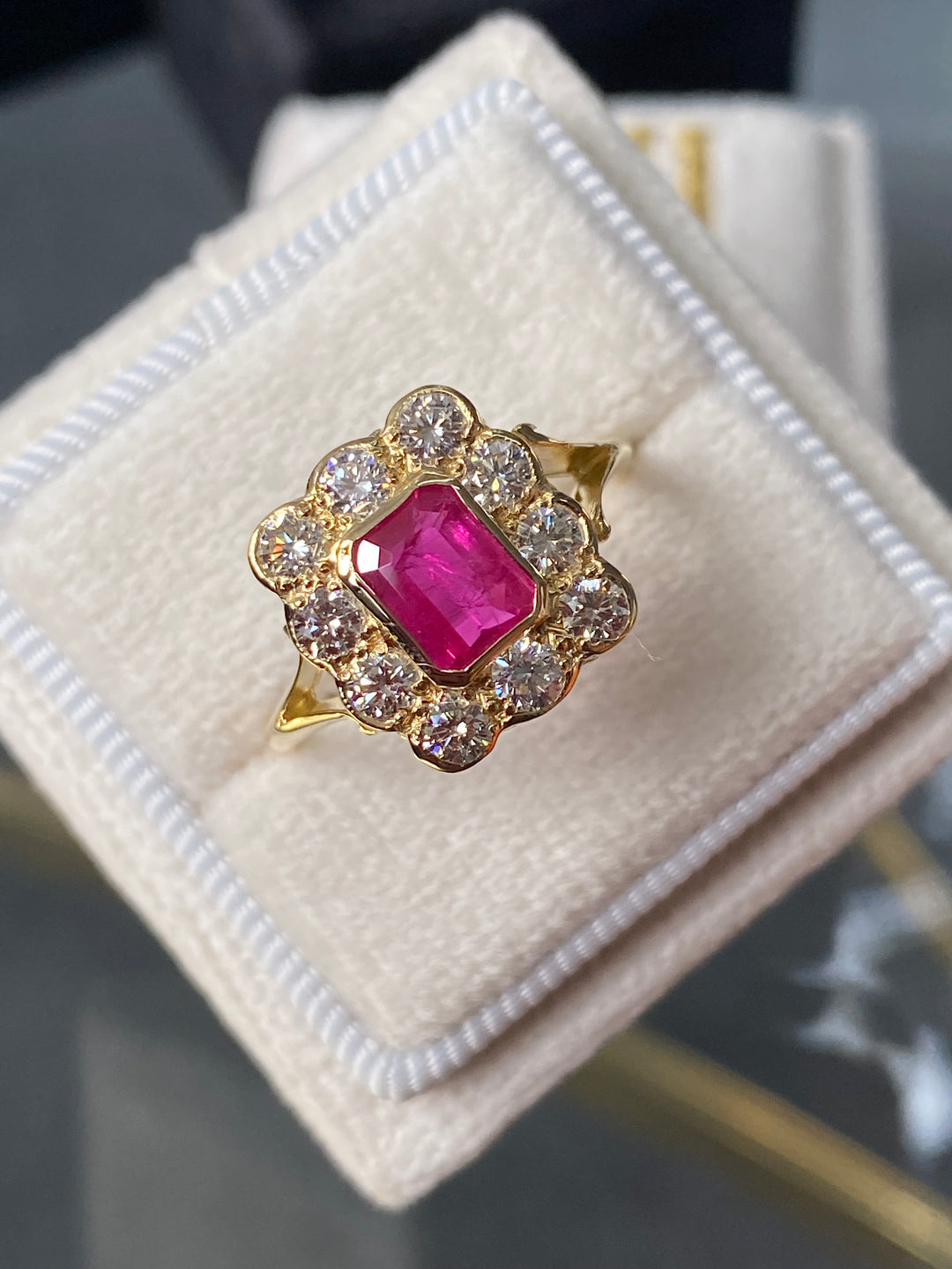 Antique style Ruby and Diamond Halo Engagement Ring in Yellow Gold