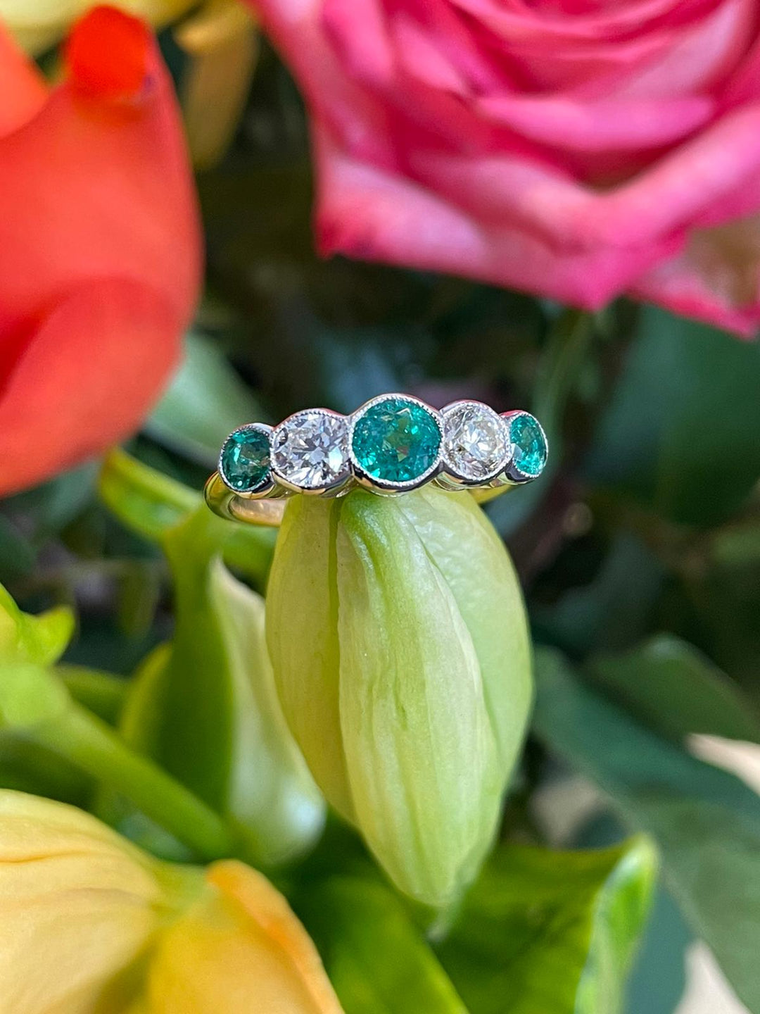Emerald and Diamond Round Brilliant Five Stone Bezel Set Eternity Wedding Band Ring in Platinum  Katherine James Jewellery