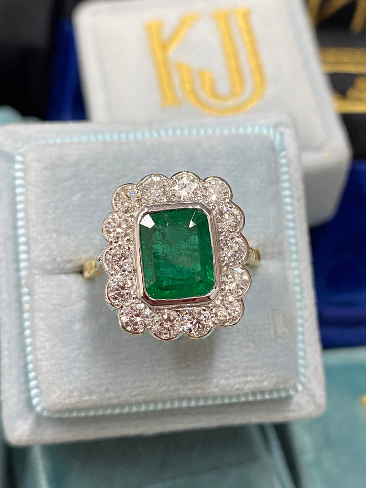 Emerald and Diamond Halo Antique Style engagement ring 