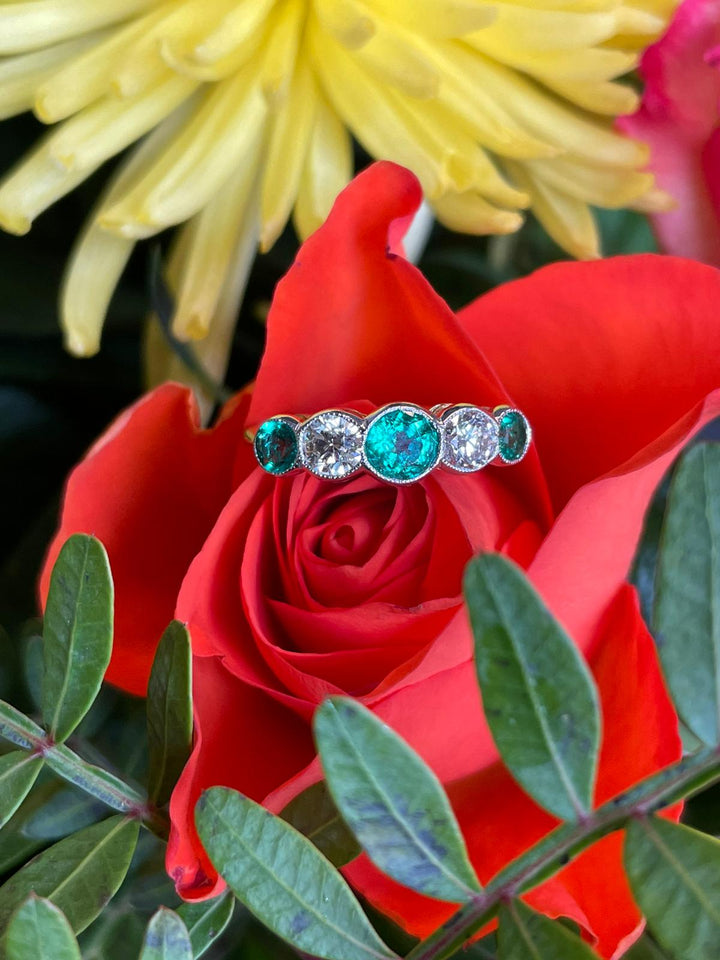 Emerald and Diamond Round Brilliant Five Stone Bezel Set Eternity Wedding Band Ring in Platinum 