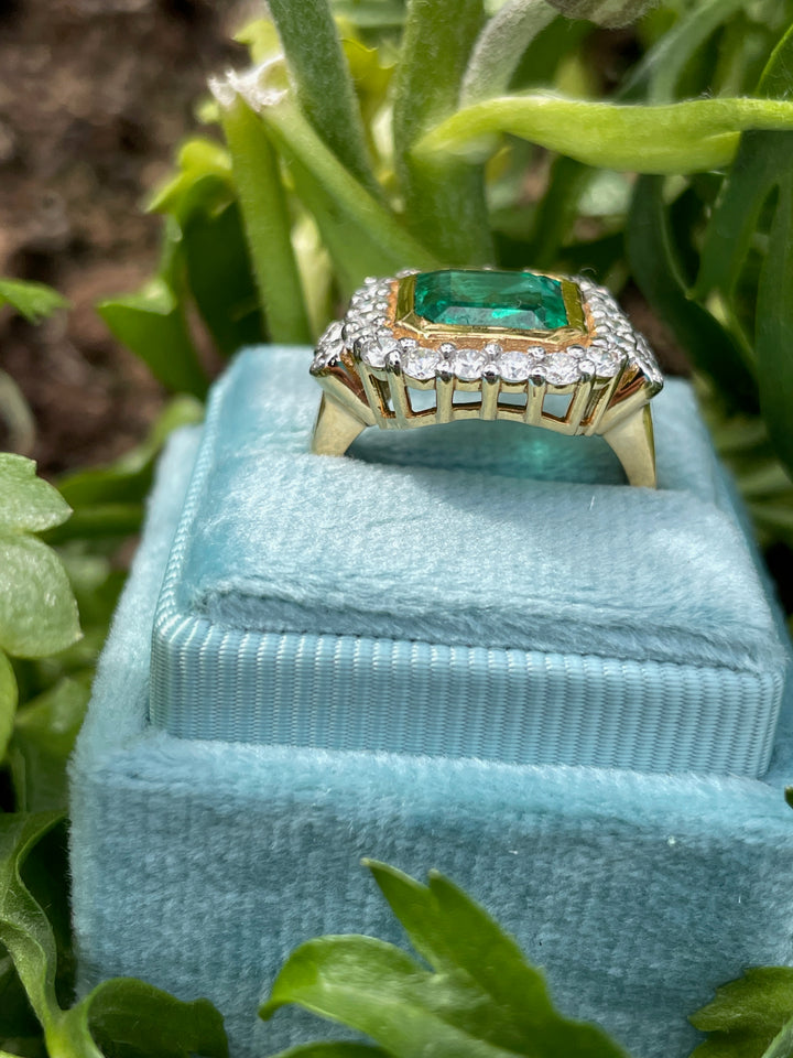 3 Carat Emerald and Diamond Halo Bezel Set Cocktail Engagement Ring in White and Yellow Gold 