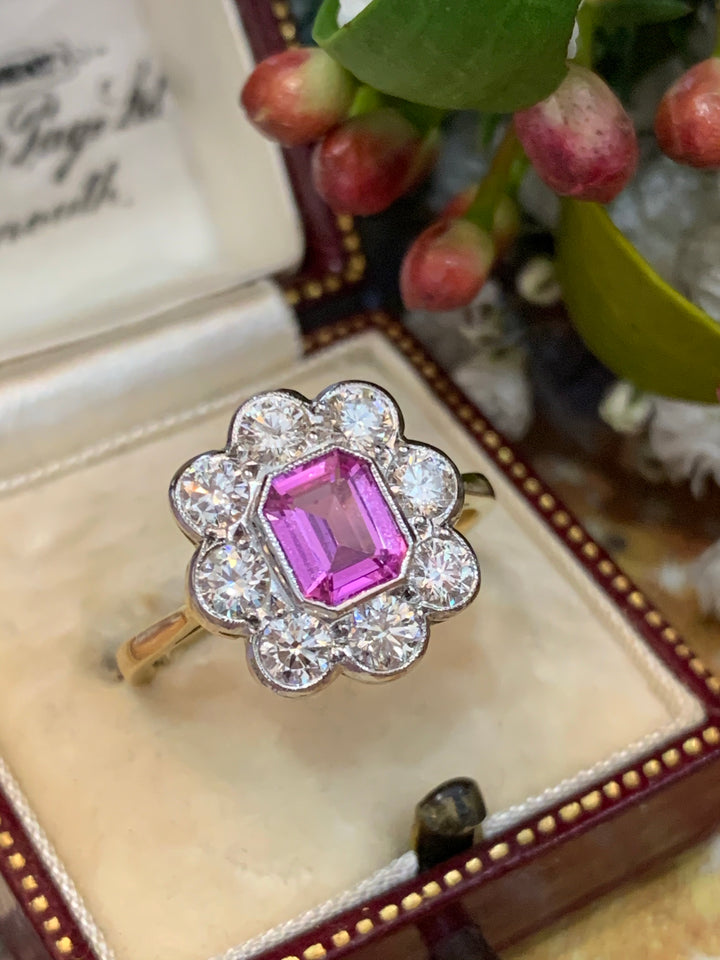 1.00 Carat Pink Sapphire and Diamond Halo Ring in 18K Gold