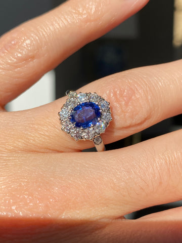 2.55 CTW Oval Blue Sapphire and Diamond Halo Engagement Ring in Platinum