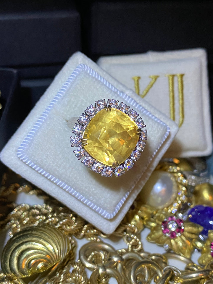 13.97 Carat Certified Unheated Yellow-Orange Sapphire and 1.05 Carat Diamond Ring