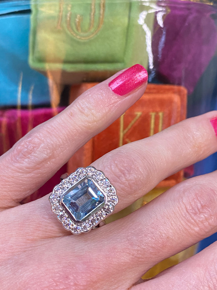 4.25 CTW Emerald Cut Blue Topaz and Moissanite Halo Cocktail Ring