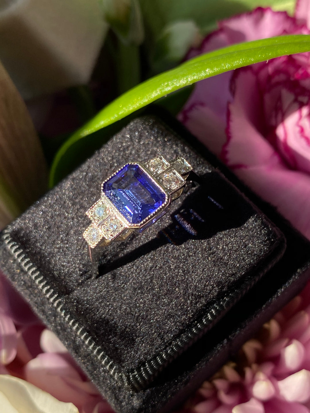 1.50 Carat Emerald Cut Tanzanite and Diamond Engagement Ring in Platinum 