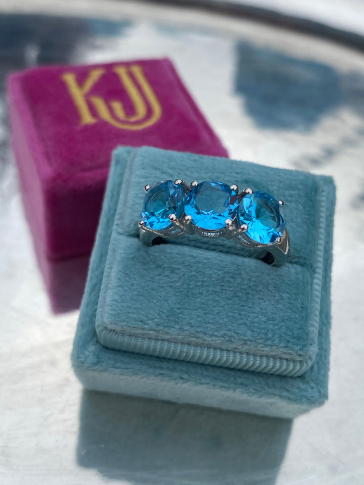Blue Topaz Three Stone Ring in Sterling Silver