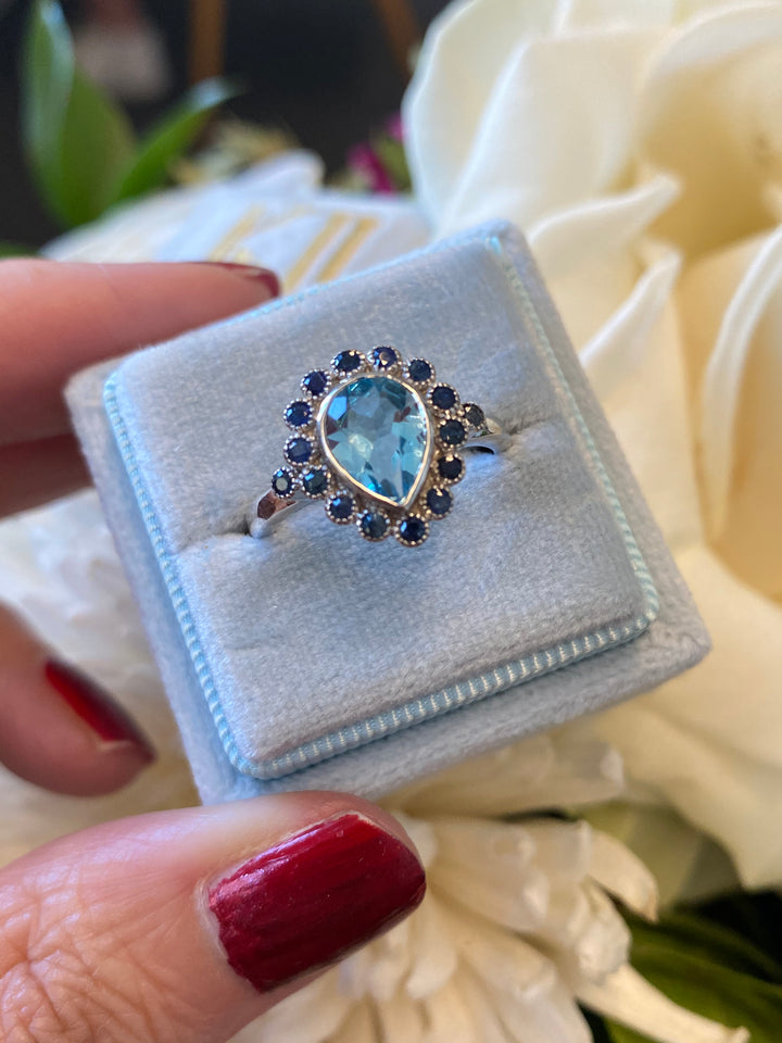 Pear Cut Blue Topaz and Blue Sapphire Halo Cocktail Ring in Sterling Silver