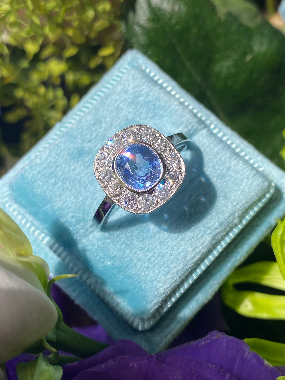 1.20 Carat Ceylon Violet Blue Sapphire and Diamond Halo Engagement Ring in Platinum