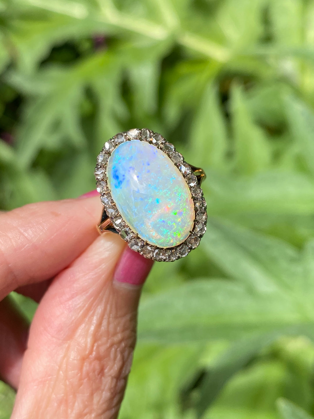 Antique Victorian White Opal and Old Euro Cut Diamond halo cocktail ring in Gold 