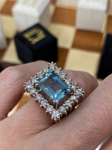 6.44 CTW East West Emerald Cut Aquamarine and Diamond Halo Cocktail Ring in Platinum
