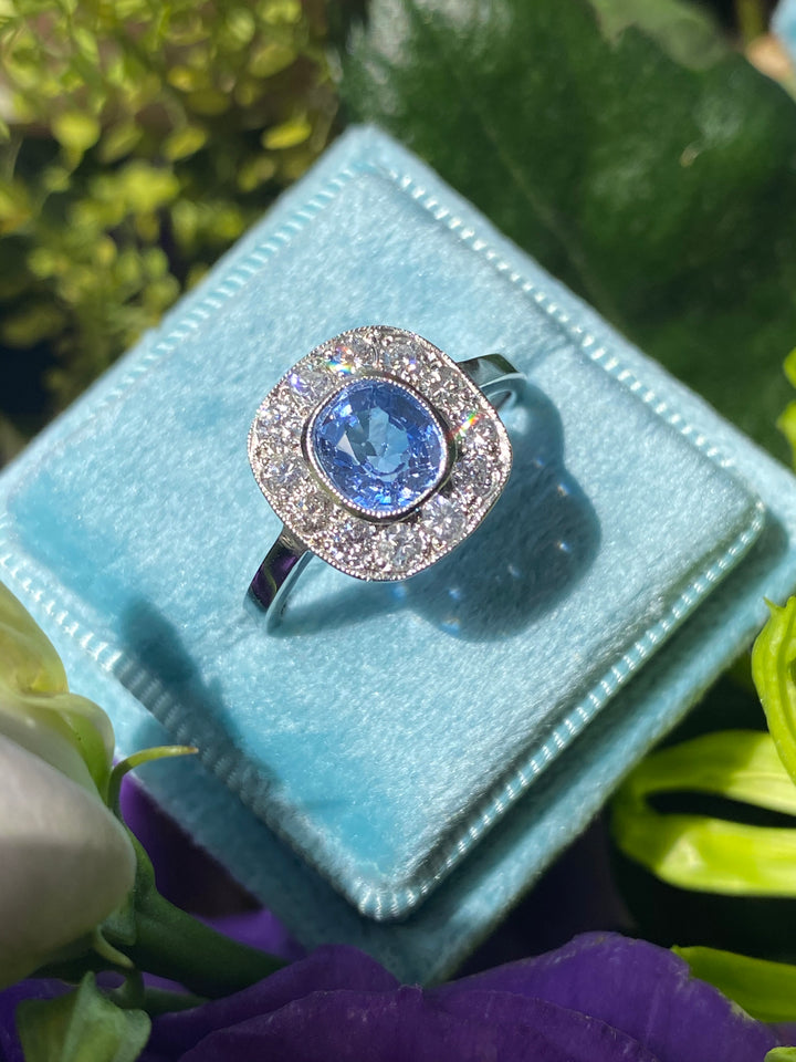 1.20 Carat Ceylon Violet Blue Sapphire and Diamond Halo Engagement Ring in Platinum