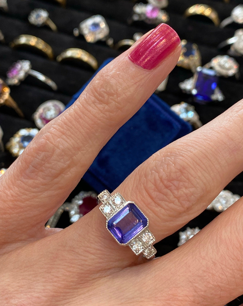 1.50 Carat emerald-cut Tanzanite and Diamond Art Deco Bezel Engagement Ring in Platinum1.50 Carat Emerald Cut Tanzanite and Diamond Engagement Ring in Platinum 