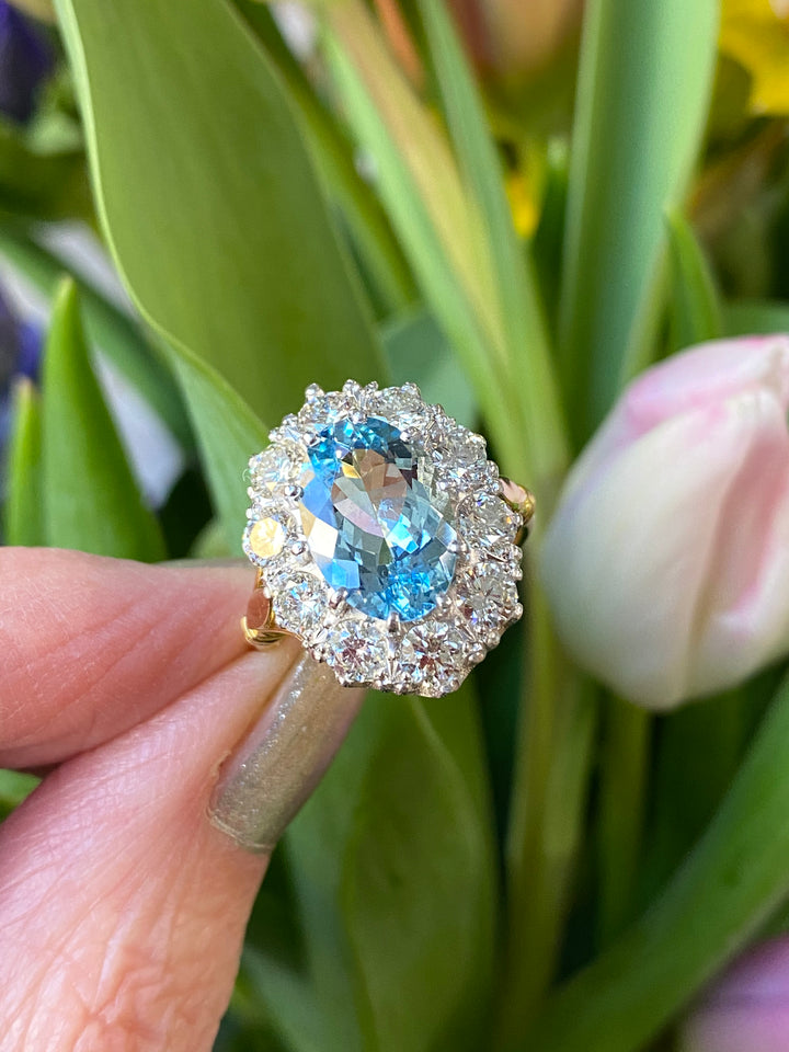 4.80 CTW Oval Aquamarine and Diamond Halo Ring in 18ct Yellow Gold