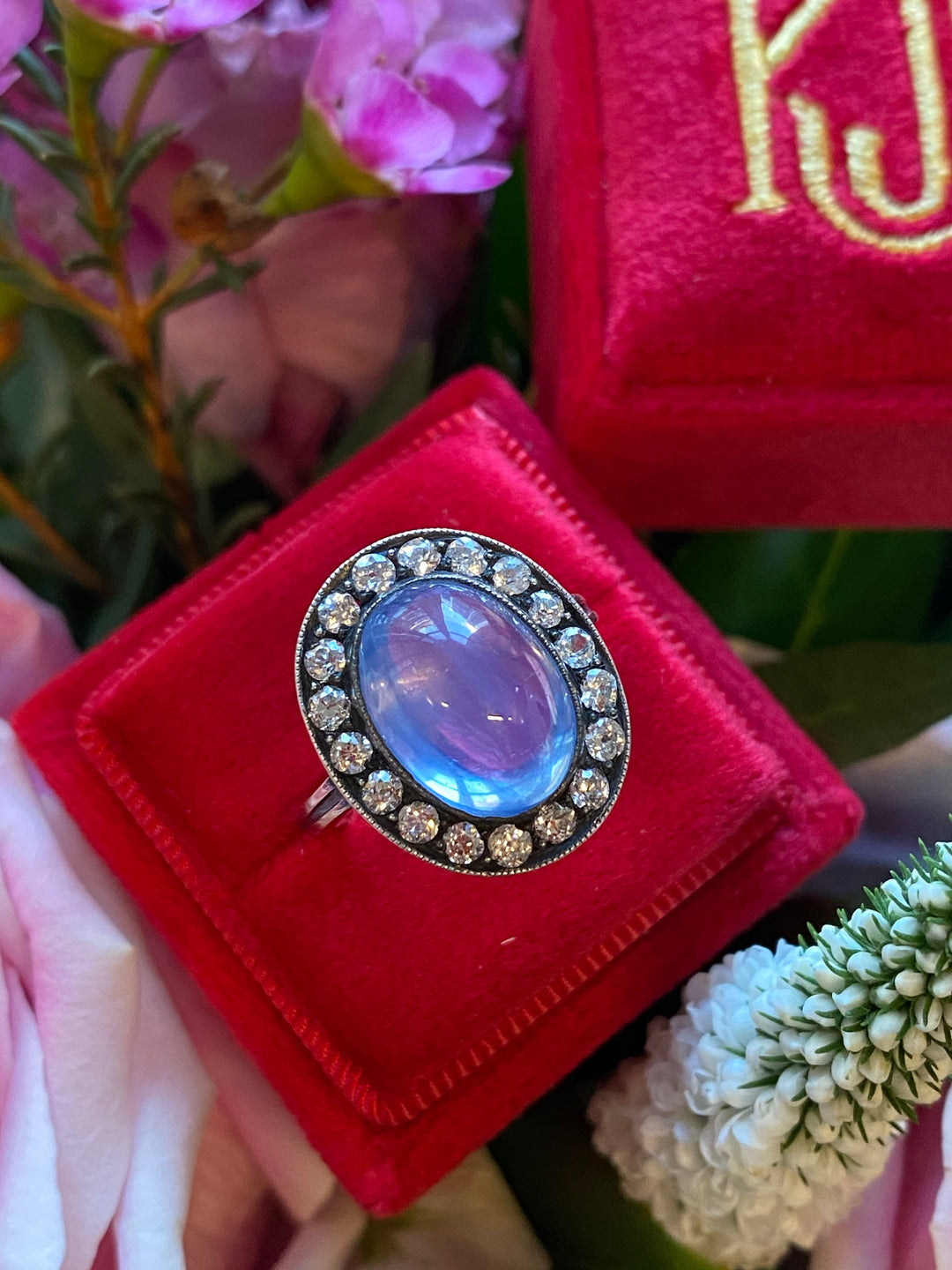 Antique No Heat Cabochon Blue Sapphire and Diamond Halo Ring 