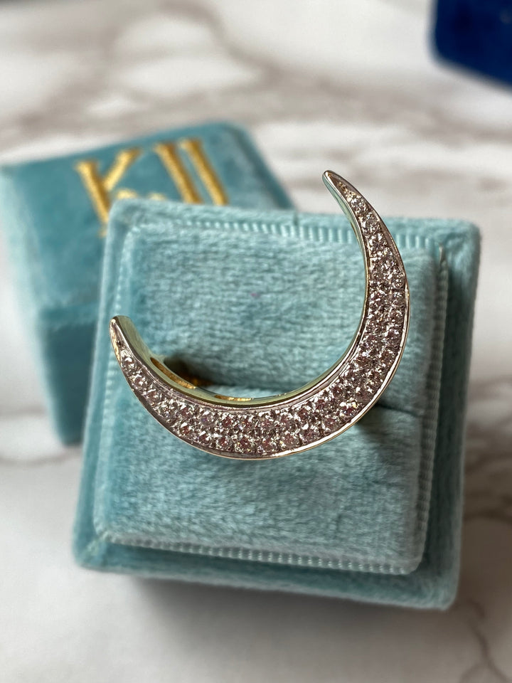 Diamond pave crescent moon cocktail ring in yellow gold 