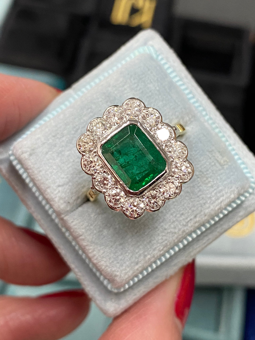 Emerald and Diamond Halo Antique Style engagement ring 