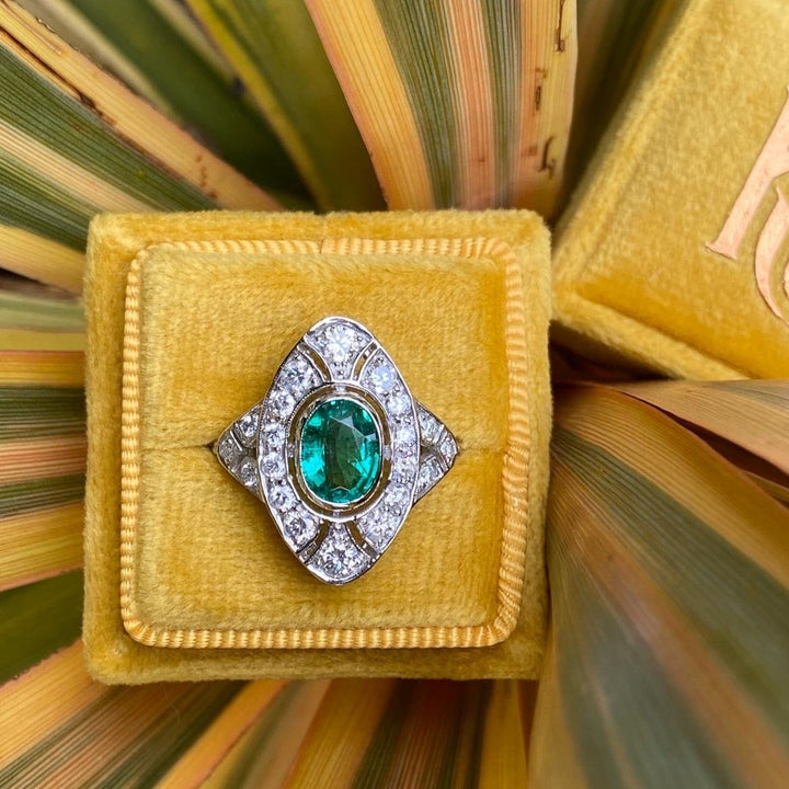 1.50 Carat Emerald and Diamond Art Deco Ring in Platinum
