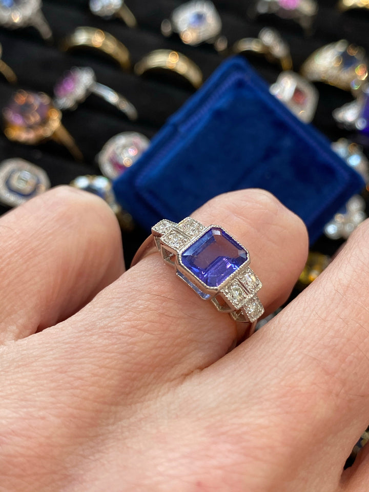 1.50 Carat emerald-cut Tanzanite and Diamond Art Deco Bezel Engagement Ring in Platinum
